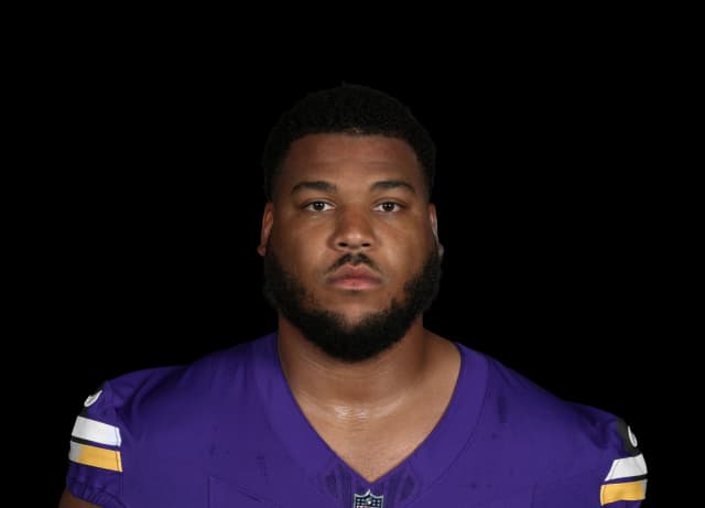 Christian Darrisaw headshot